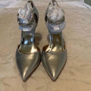 Badgley Mischa silver evening shoes with a rhinestone buckle..